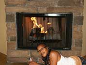 lady in front of fireplace